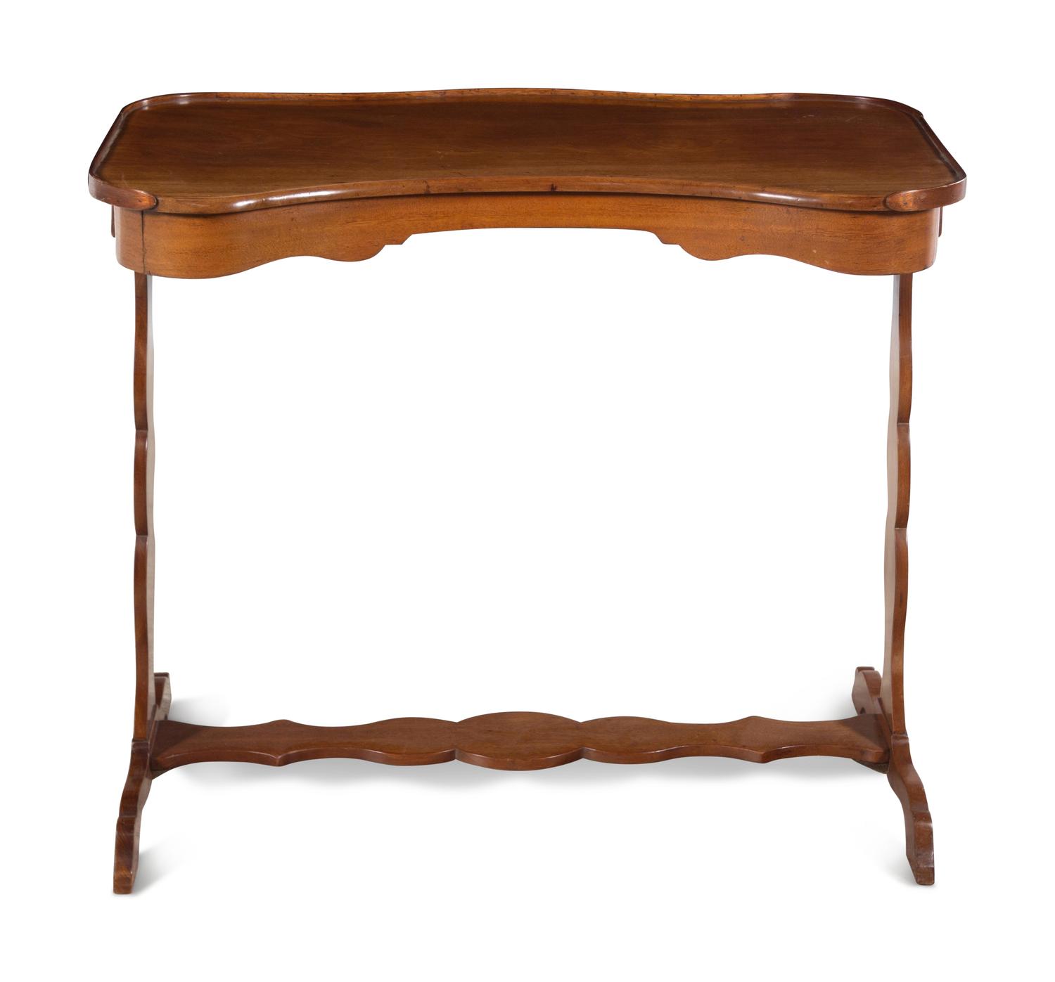 A French Mahogany Reniform Writing Table