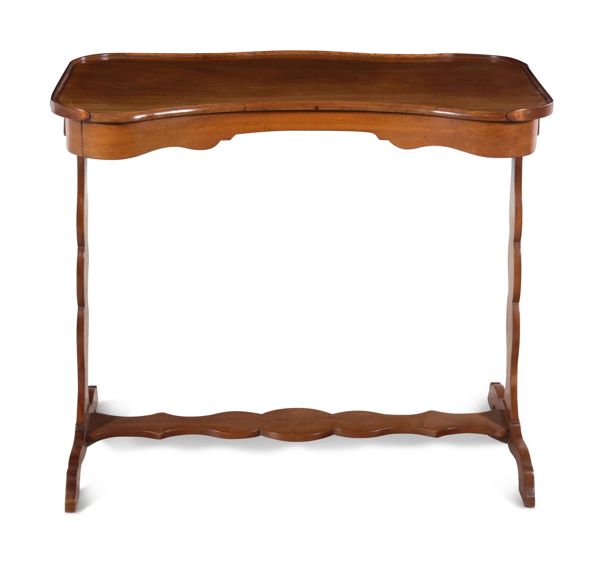A French Mahogany Reniform Writing Table