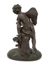 A French Bronze Figure of Eros on a Wood Base