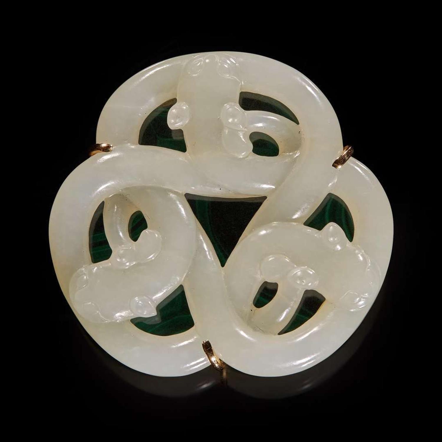 A Chinese white jade "three qilong" pendant 三螭龍玉珮