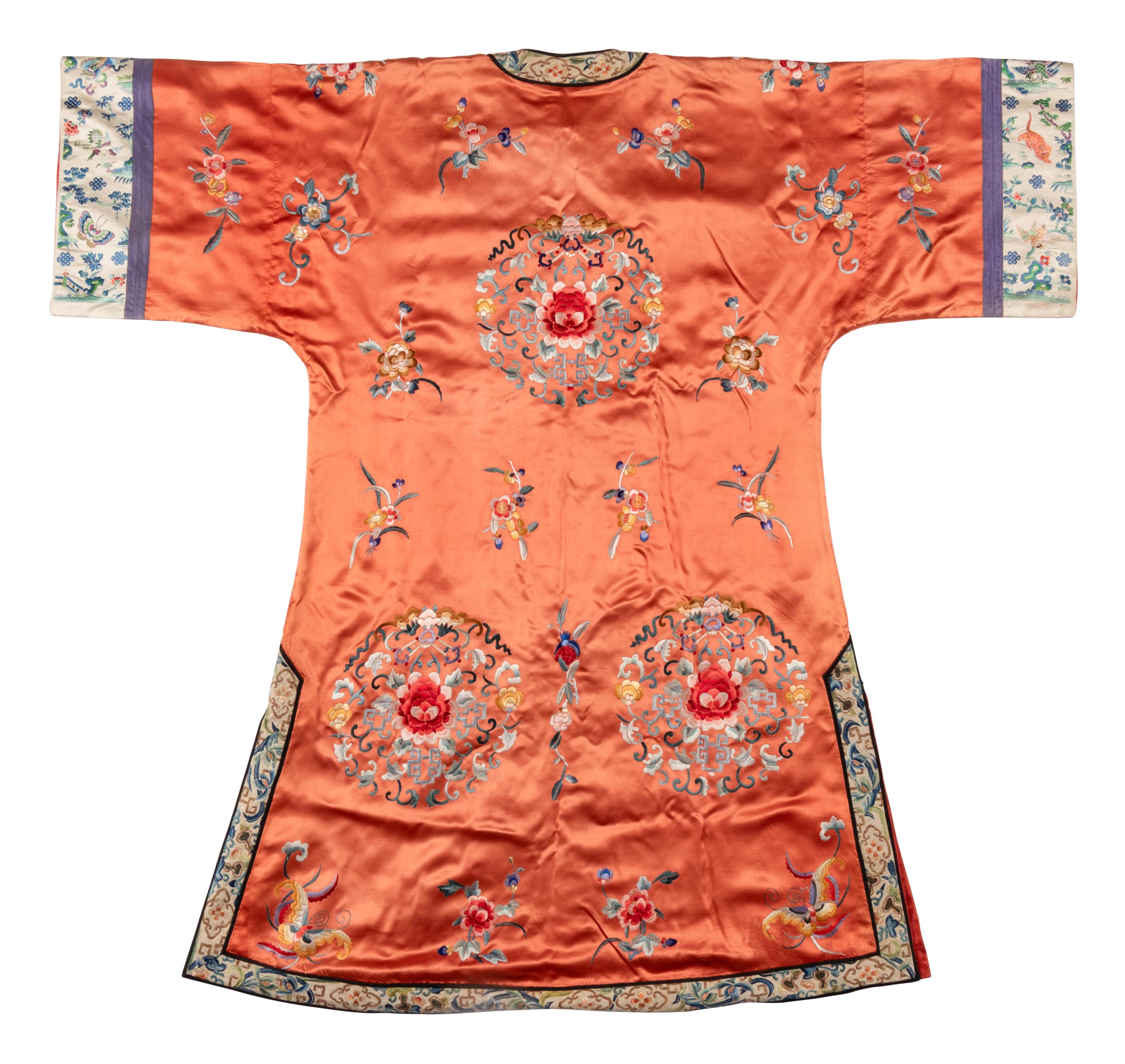 A Chinese Apricot Ground Embroidered Silk Lady's Robe