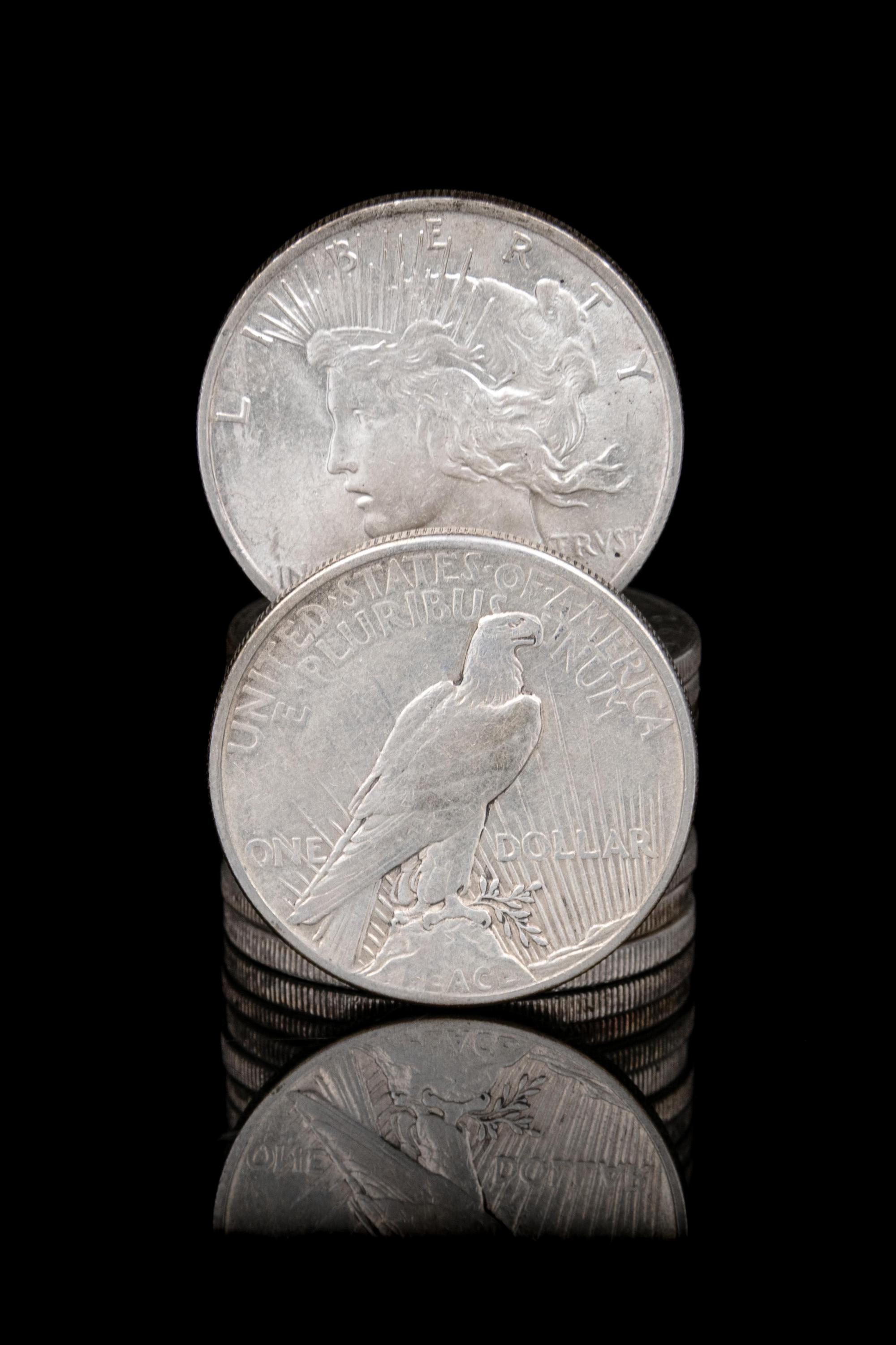 A Group of Eleven Peace $1 Coins