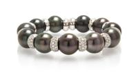 An 18 Karat White Gold, Diamond and Cultured South Sea Pearl Bracelet, Italian, 51.50 dwts.