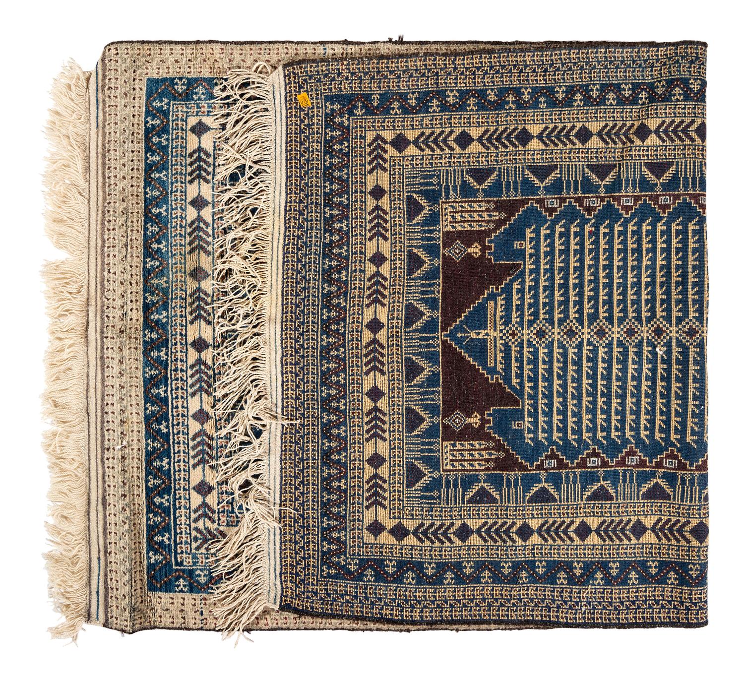 A Turkish or Afghan Wool Rug