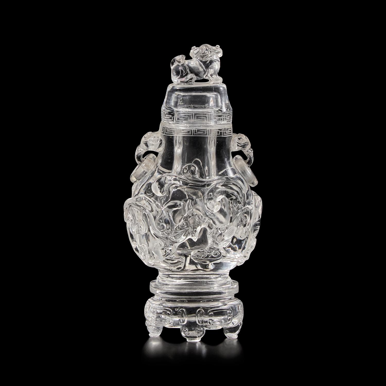 A Chinese Rock Crystal Vase, Cover, and Stand, 19th Century 清晚期 水晶雕螭龍雙耳瓶