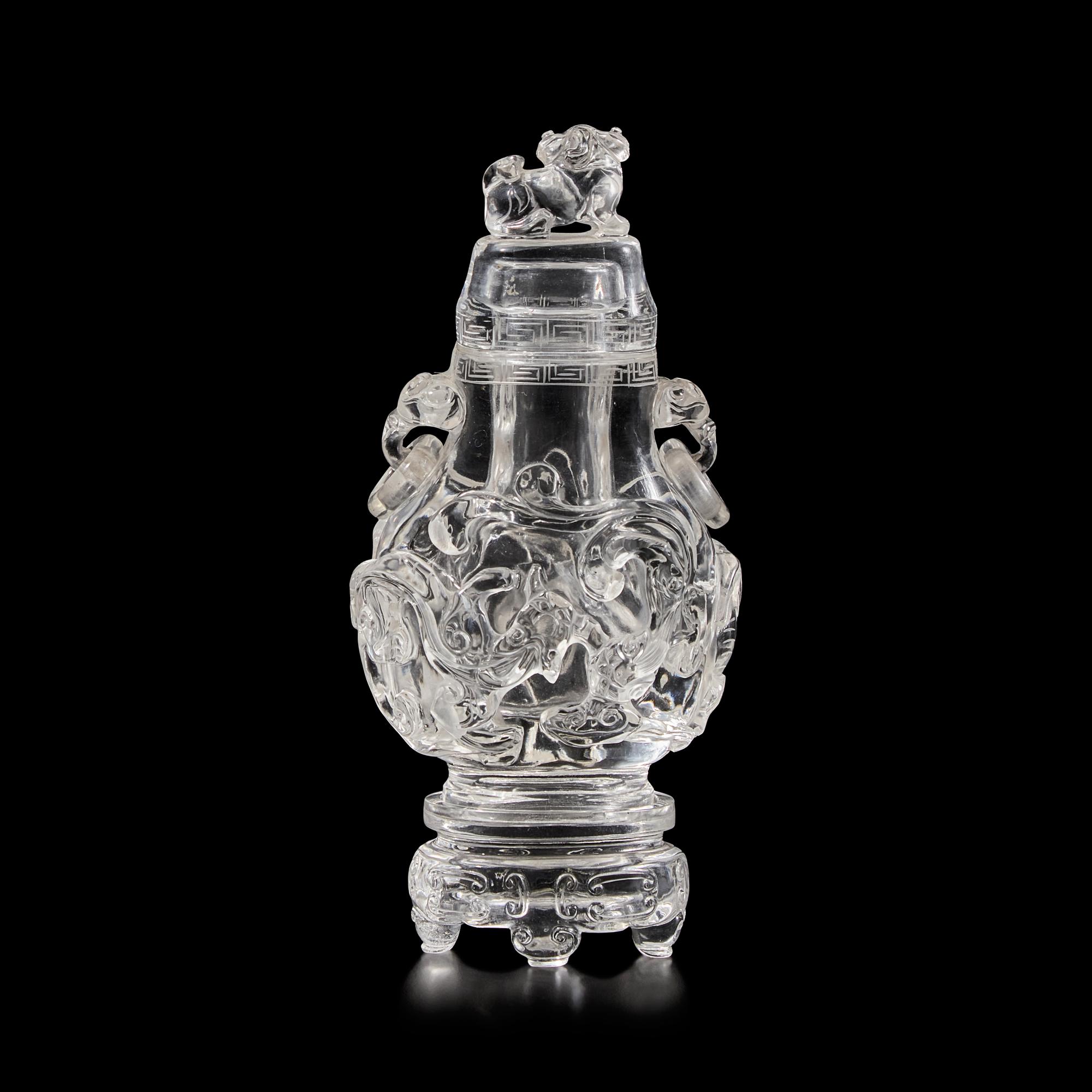 A Chinese Rock Crystal Vase, Cover, and Stand, 19th Century 清晚期 水晶雕螭龍雙耳瓶