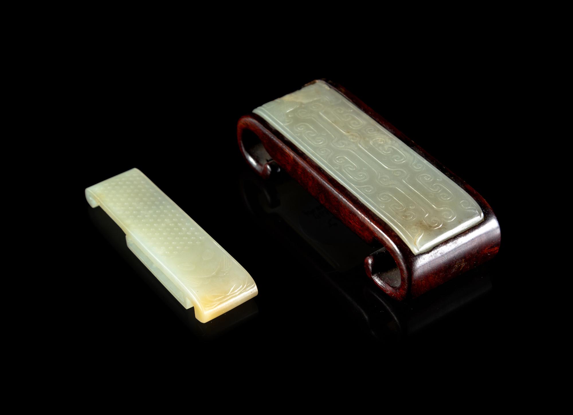 Two White Jade Sword Slides