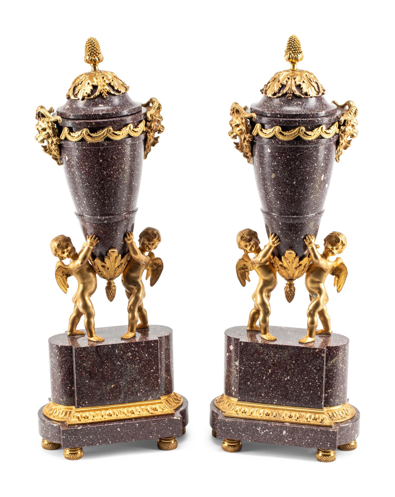A Pair of Directoire Style Gilt Bronze and Marble Urn Ornaments