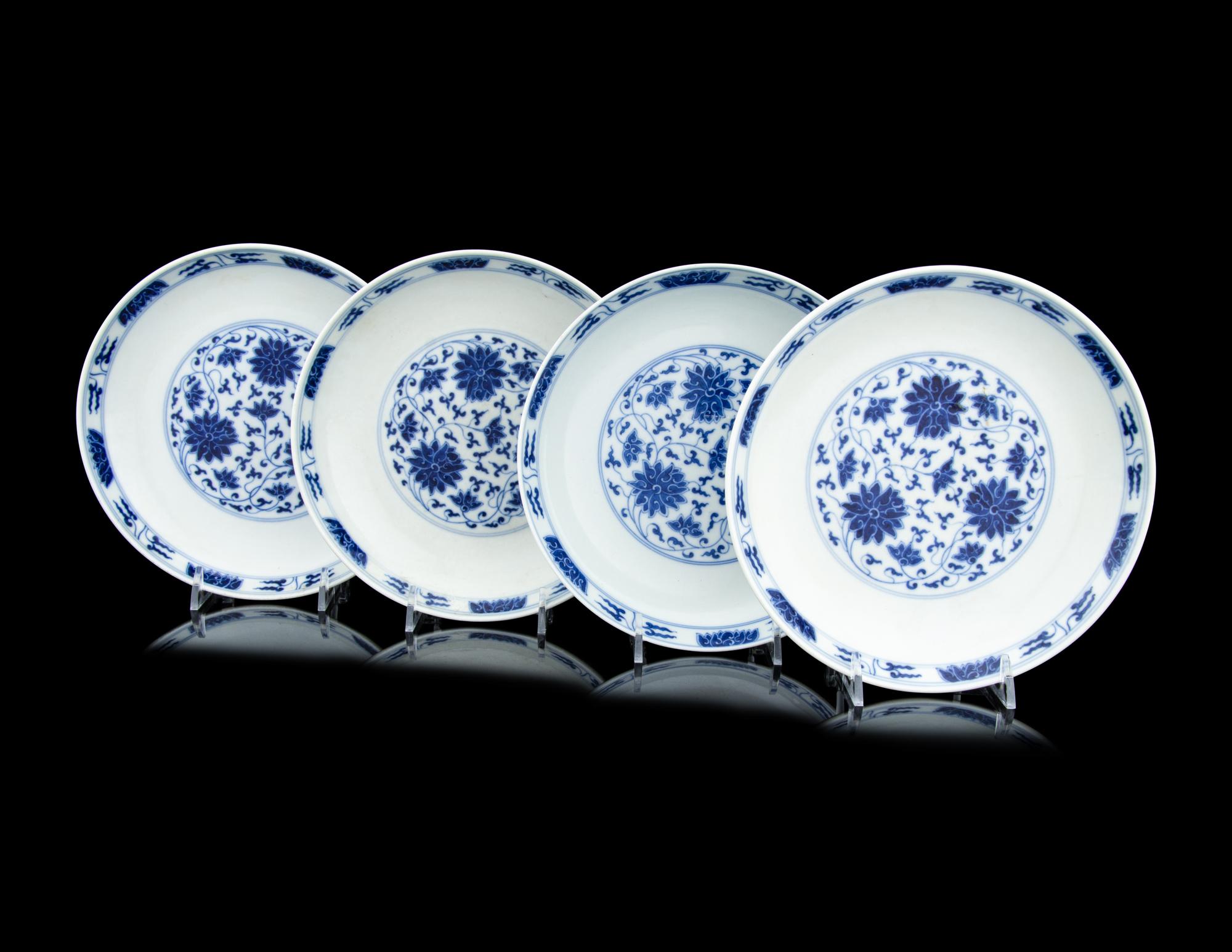 Four Chinese Blue and White Porcelain 'Lotus' Plates