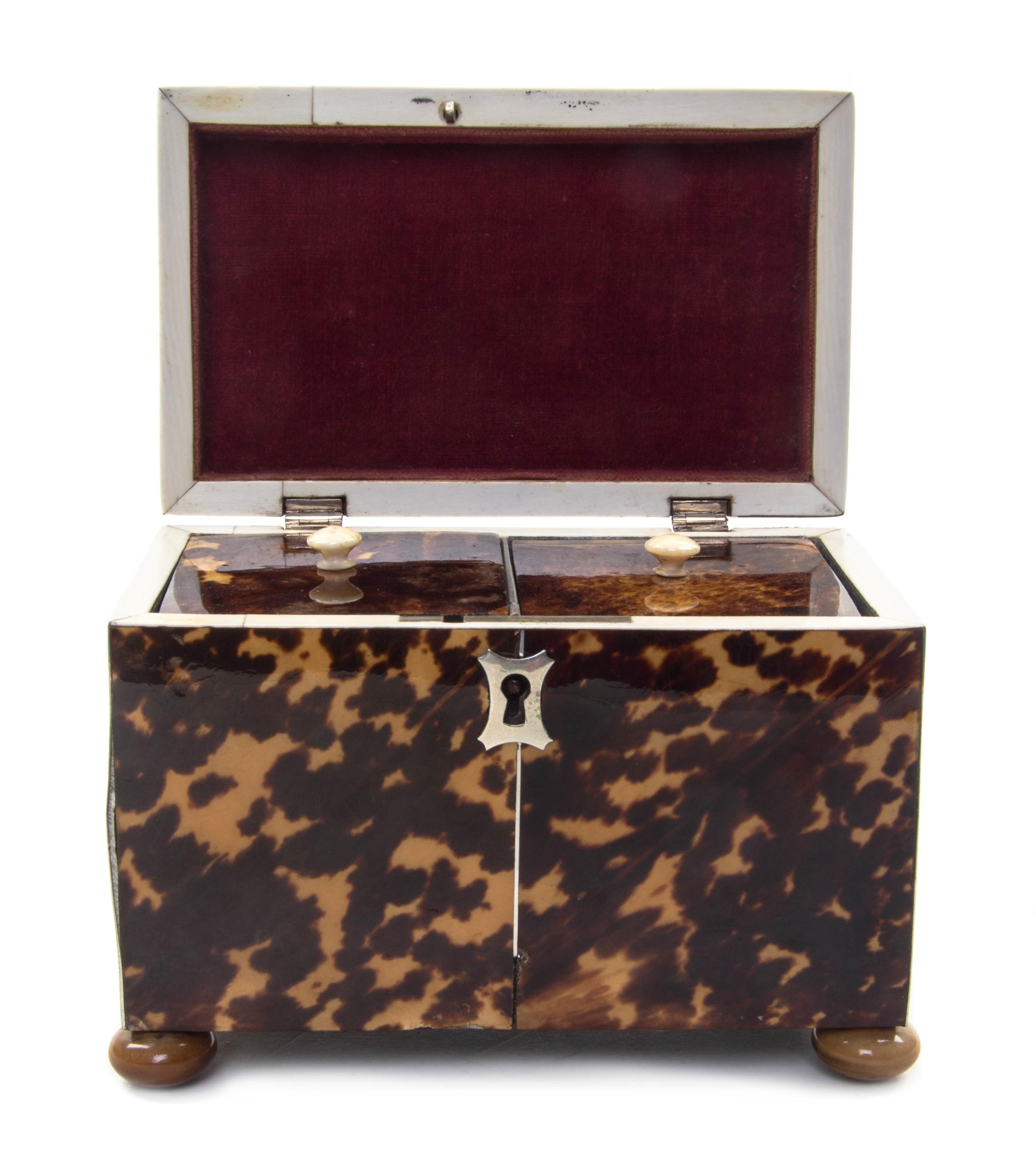 An English Tortoise Shell Tea Caddy, Height 4 1/4 x width 5 x depth 3 inches.