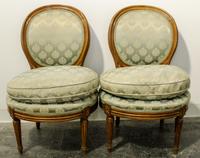 A Pair of Louis XVI Style Chauffeuses Height 31 inches. — 20TH CENTURY