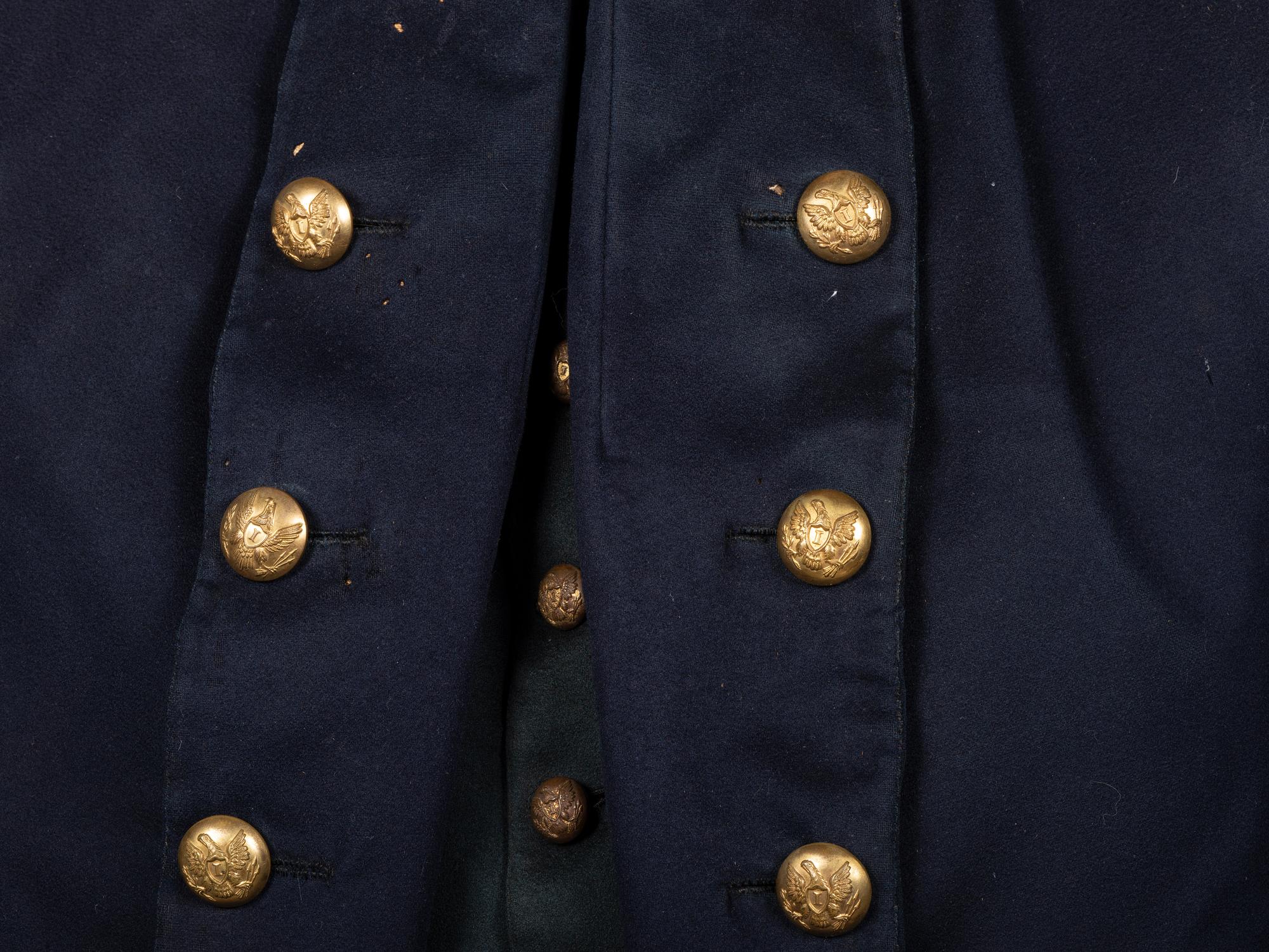 [CIVIL WAR]. Identified uniform grouping including frock coat, vest, and sash of Lt. Colonel John T. Lockman, 83rd and 119th New York Regiments, WIA at Gettysburg.