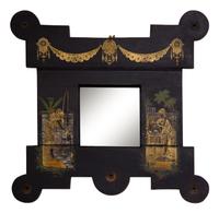 An Aesthetic Movement Gilt Decorated Ebonized Wall Mirror
