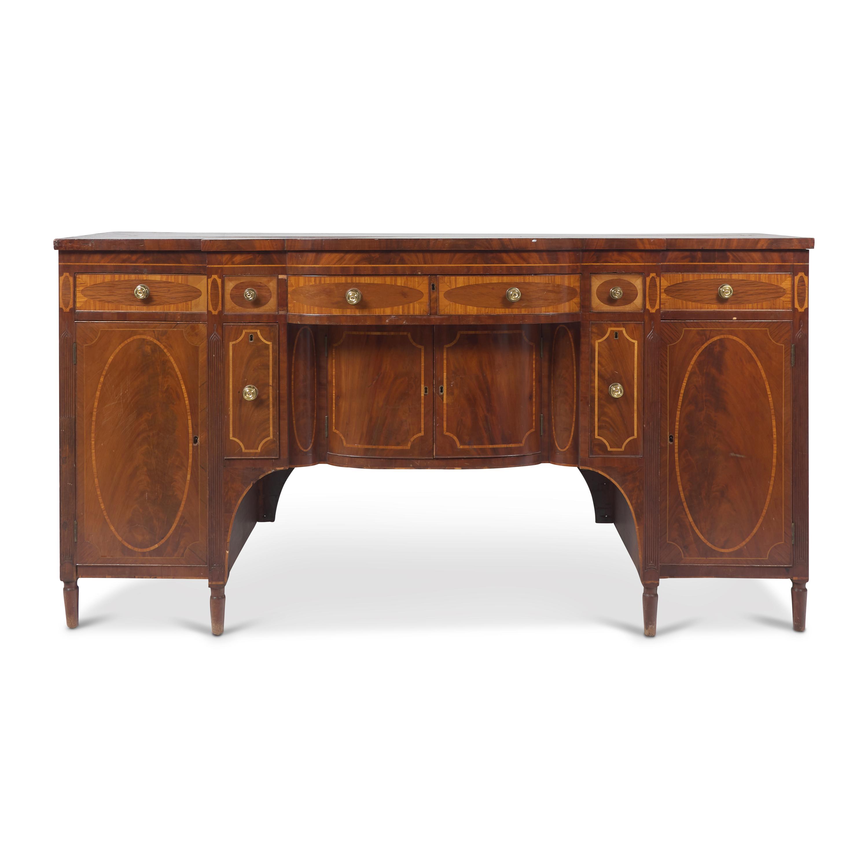 A Federal Inlaid, Figured and Carved Mahogany Sideboard