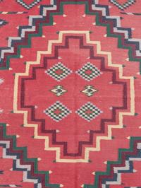 An Indian Wool Navajo Style Rug Retailed by Ralph Lauren
