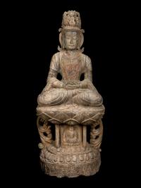 A Chinese Carved Stone Seated Guanyin Figure