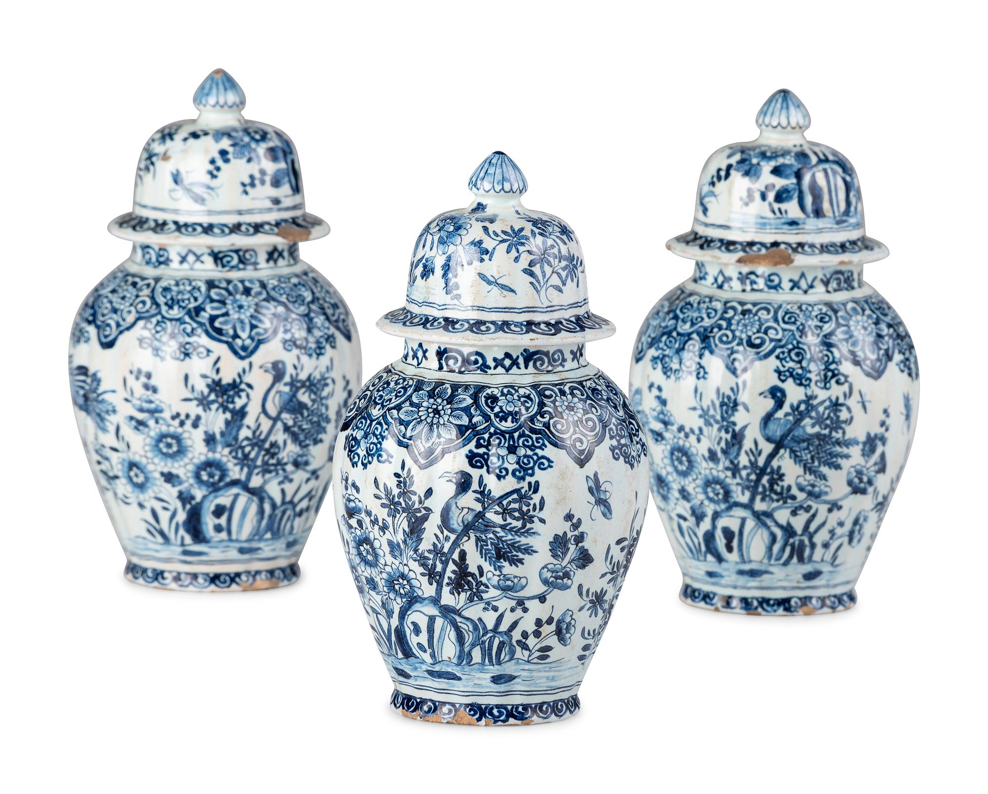 A Three Piece Delftware Garniture