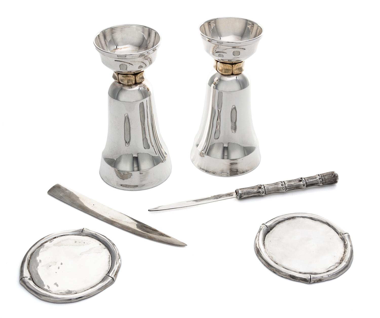 A Group of Six Silver Articles, Various makers, 20th Century, comprising a pair of candlesticks, two coasters and two letter openers.