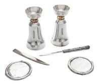A Group of Six Silver Articles, Various makers, 20th Century, comprising a pair of candlesticks, two coasters and two letter openers.