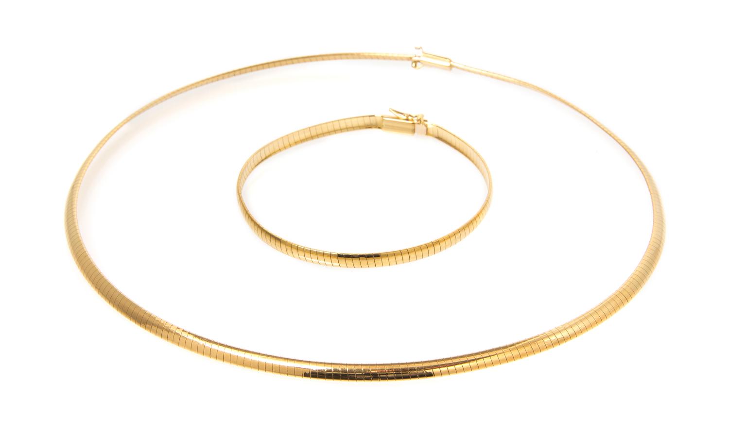 An 18 Karat Yellow Gold Omega Chain Demi Parure, 16.90 dwts.