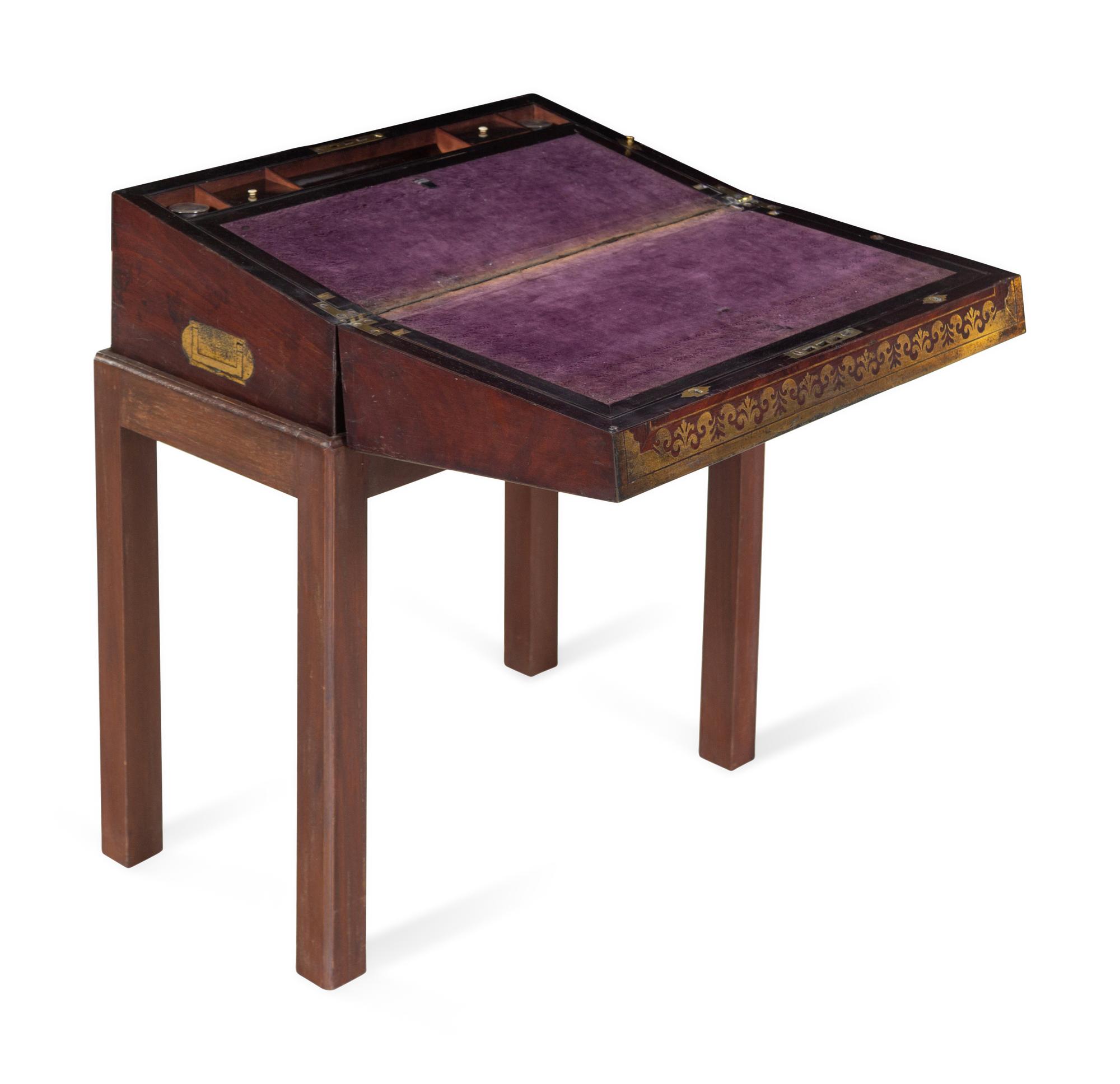 A Regency Brass Inlaid Mahogany Writing Box on a Later Stand