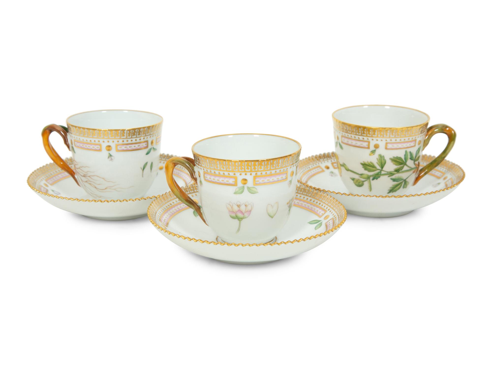 A Set of Nine Royal Copenhagen Flora Danica Porcelain Teacups and Saucers