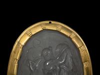 A Pair of French Molded Glass Cameo Plaques in Gilt Bronze Frames