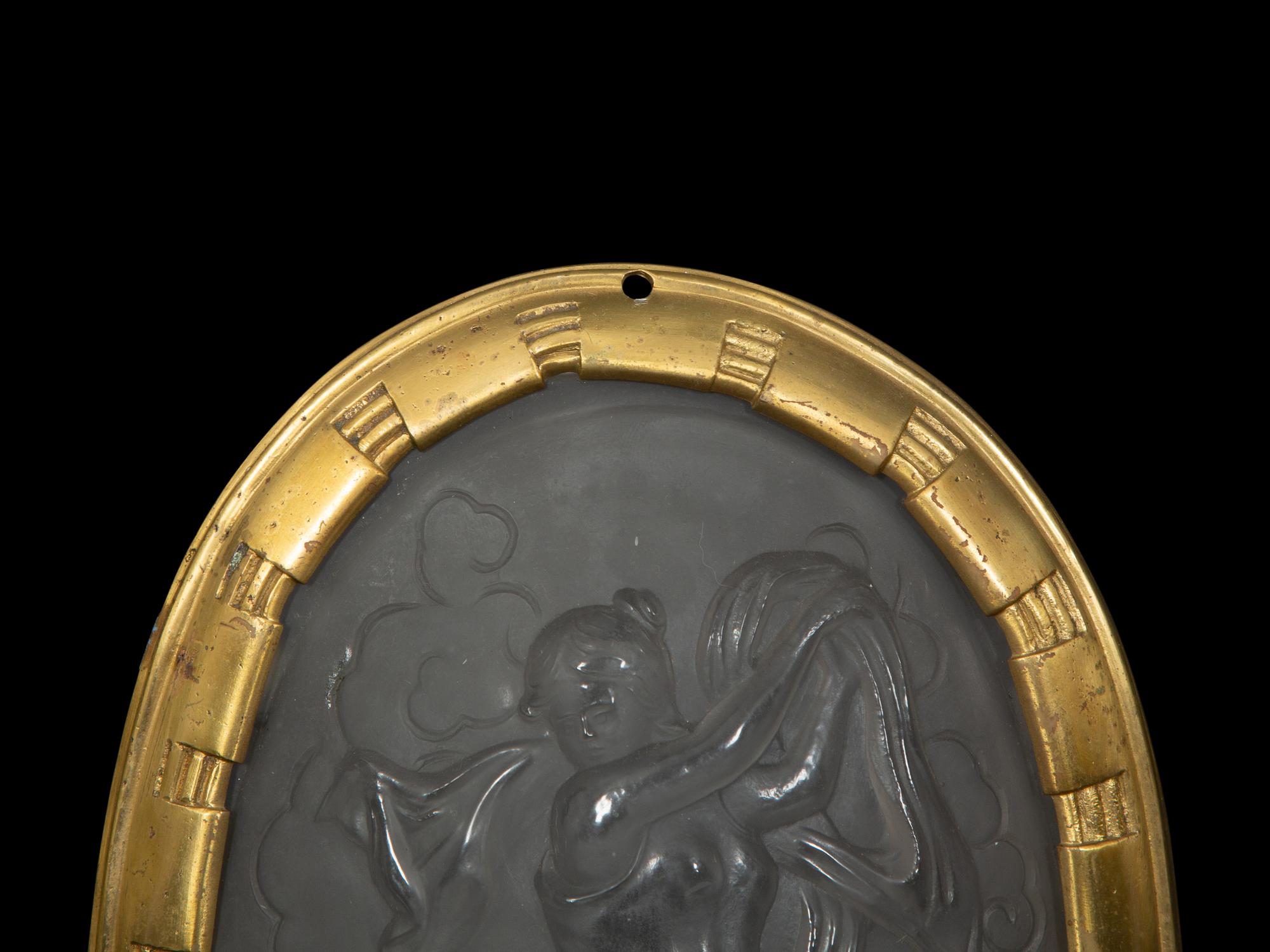A Pair of French Molded Glass Cameo Plaques in Gilt Bronze Frames
