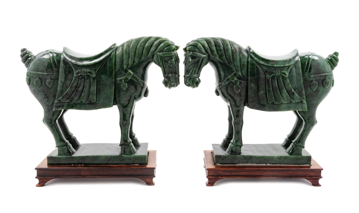 A Pair of Chinese Spinach Jade Models of Horses