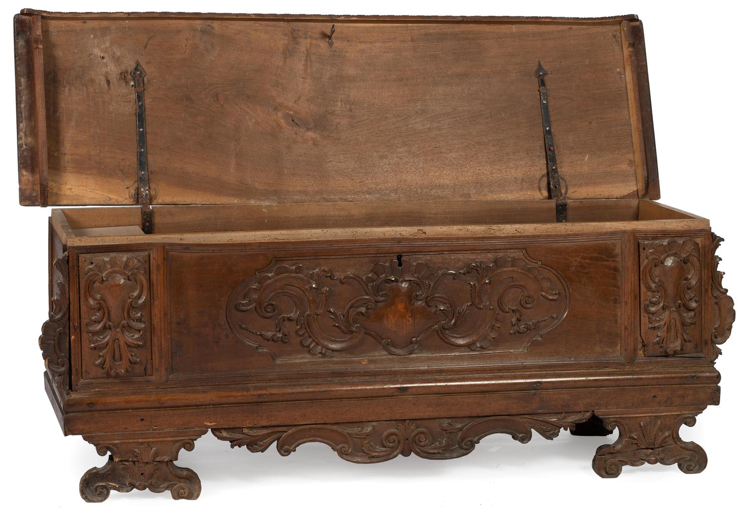 An Italian Carved Walnut Cassone
