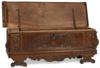 An Italian Carved Walnut Cassone