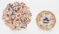 Two Porcelain Plates Diameter of larger 9 7/8 inches.