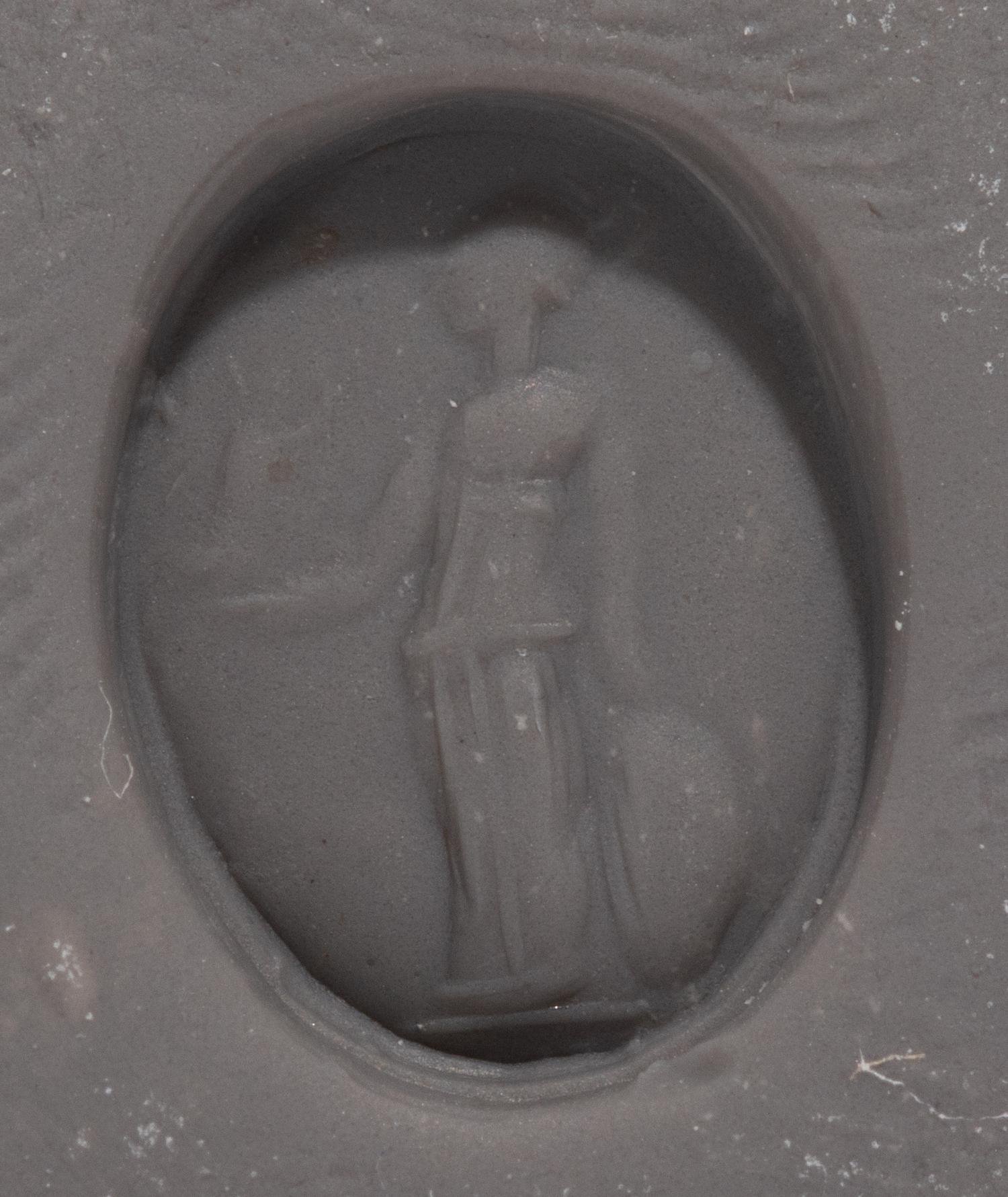 A Roman Banded Agate Ring Stone with the Gods Athena and Nike