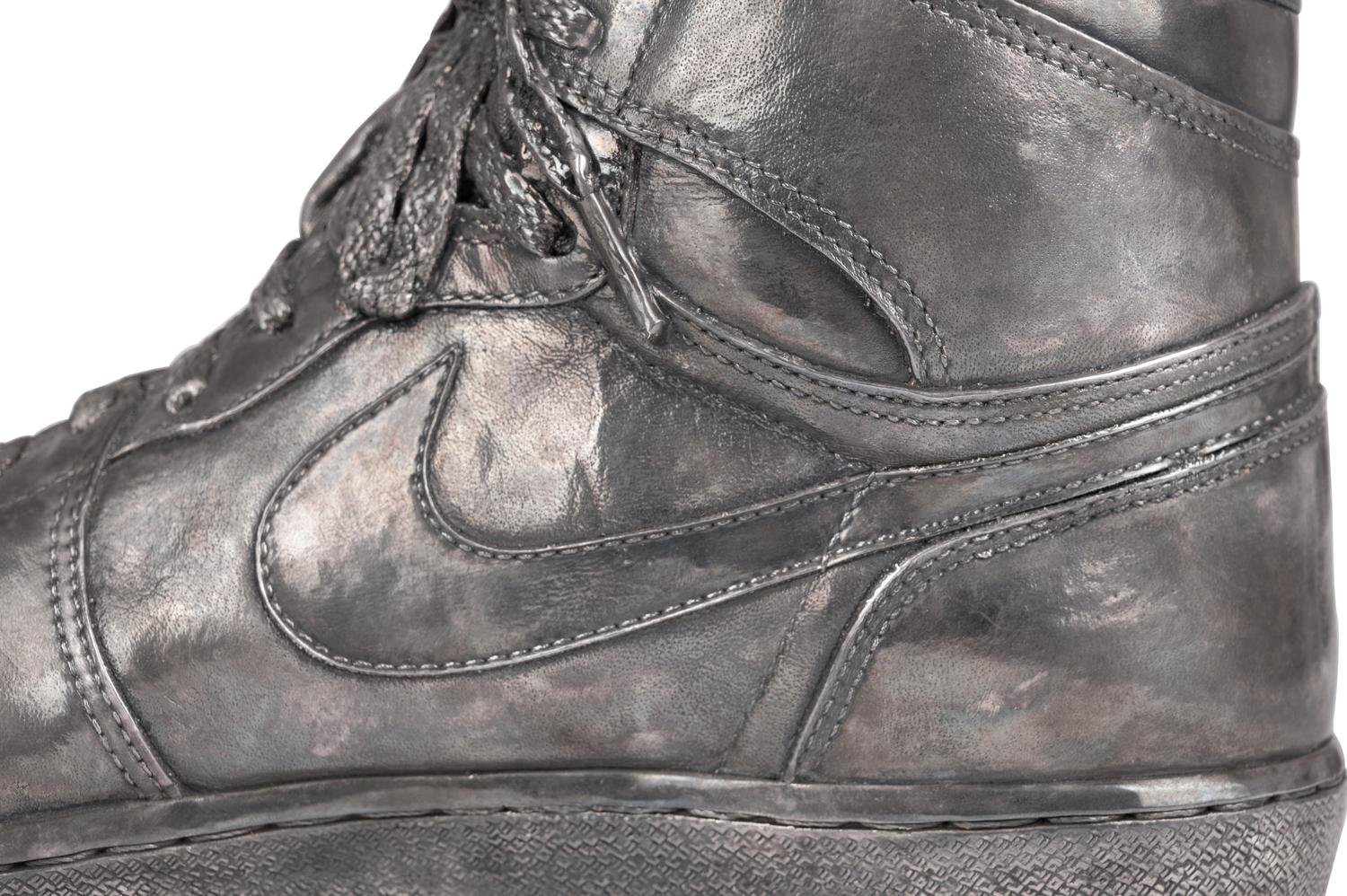 A Nike Air Jordan 1 Silver Cast Basketball Shoe Crafted for Michael Jordan's 32nd Birthday