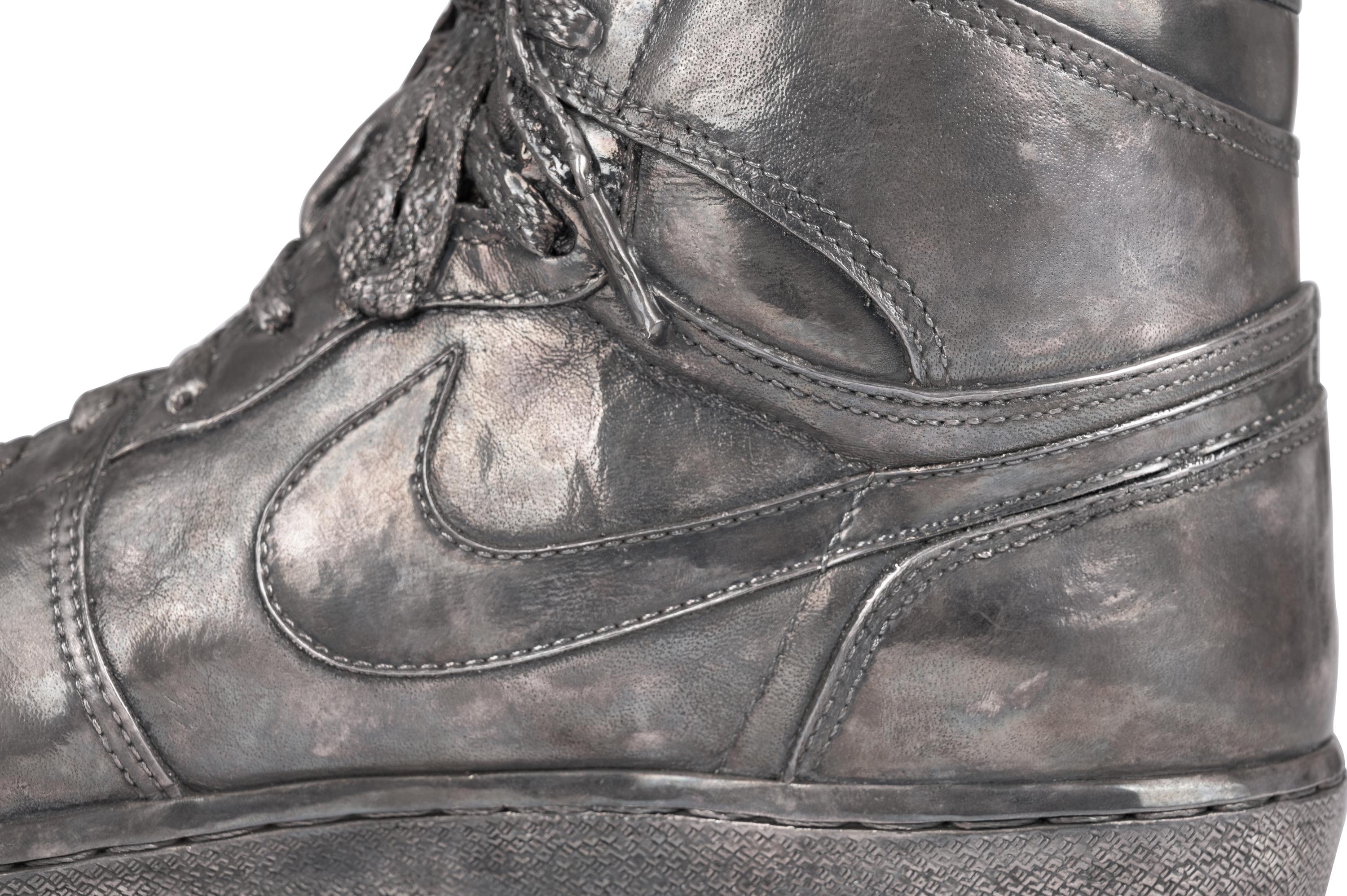 A Nike Air Jordan 1 Silver Cast Basketball Shoe Crafted for Michael Jordan's 32nd Birthday