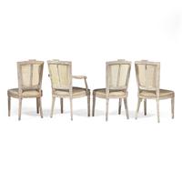 A Set of Four Louis XVI Carved and Painted Dining Chairs