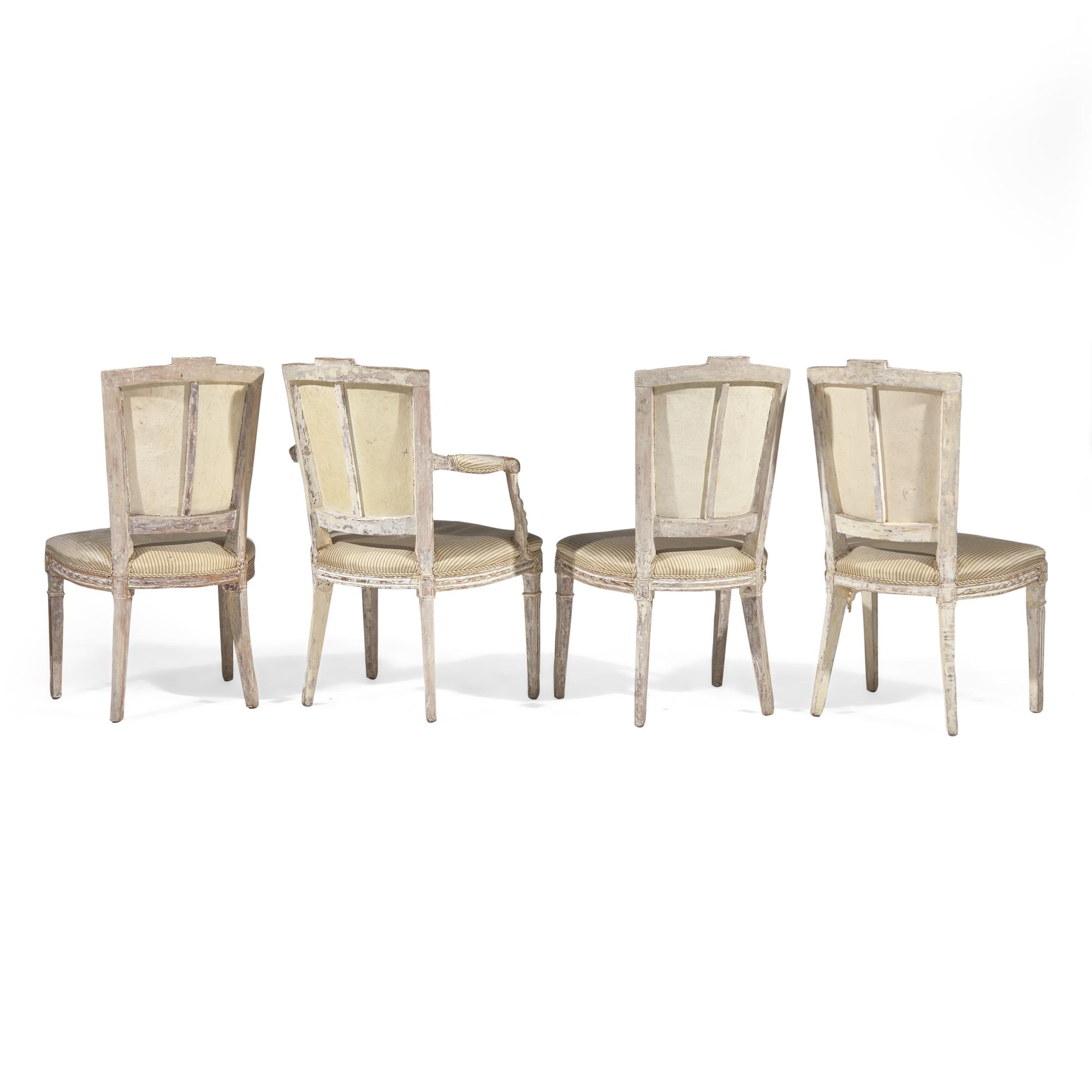 A Set of Four Louis XVI Carved and Painted Dining Chairs