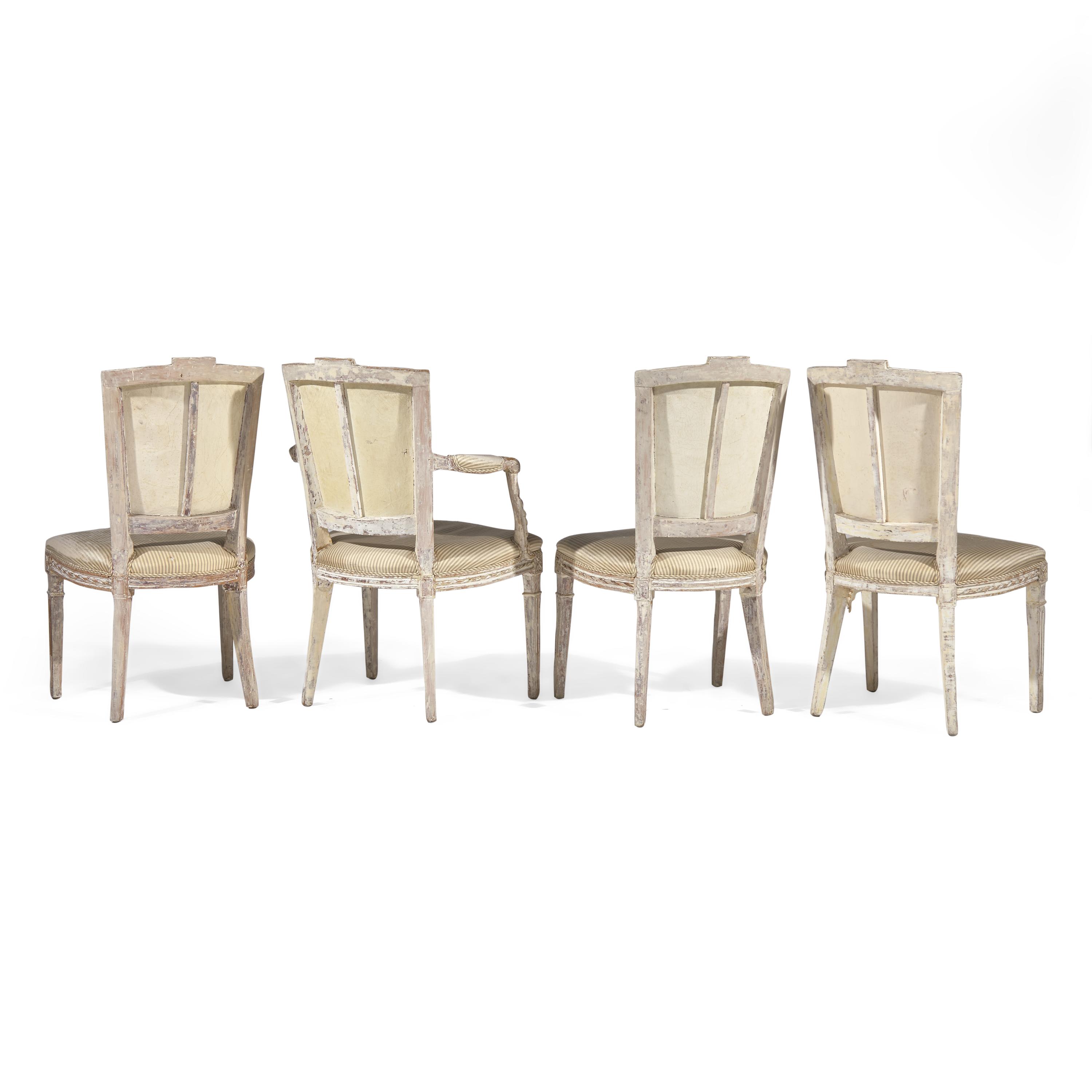 A Set of Four Louis XVI Carved and Painted Dining Chairs