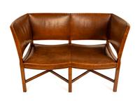 An Unusual George III Style Leather-Upholstered Settee — 20TH CENTURY