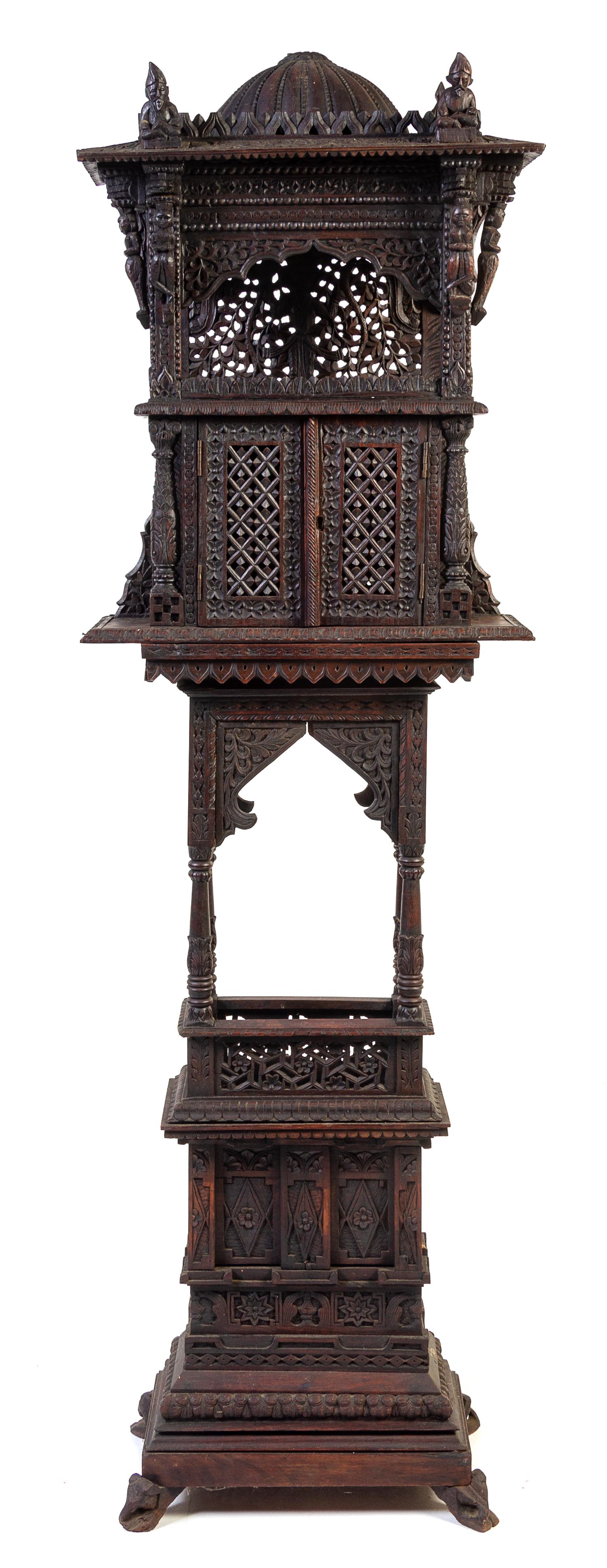 An Anglo-Indian Pierce Carved Shrine Cabinet Height 68 x width 20 1/2 x depth 8 3/4 inches. — LATE 19TH/EARLY 20TH CENTURY