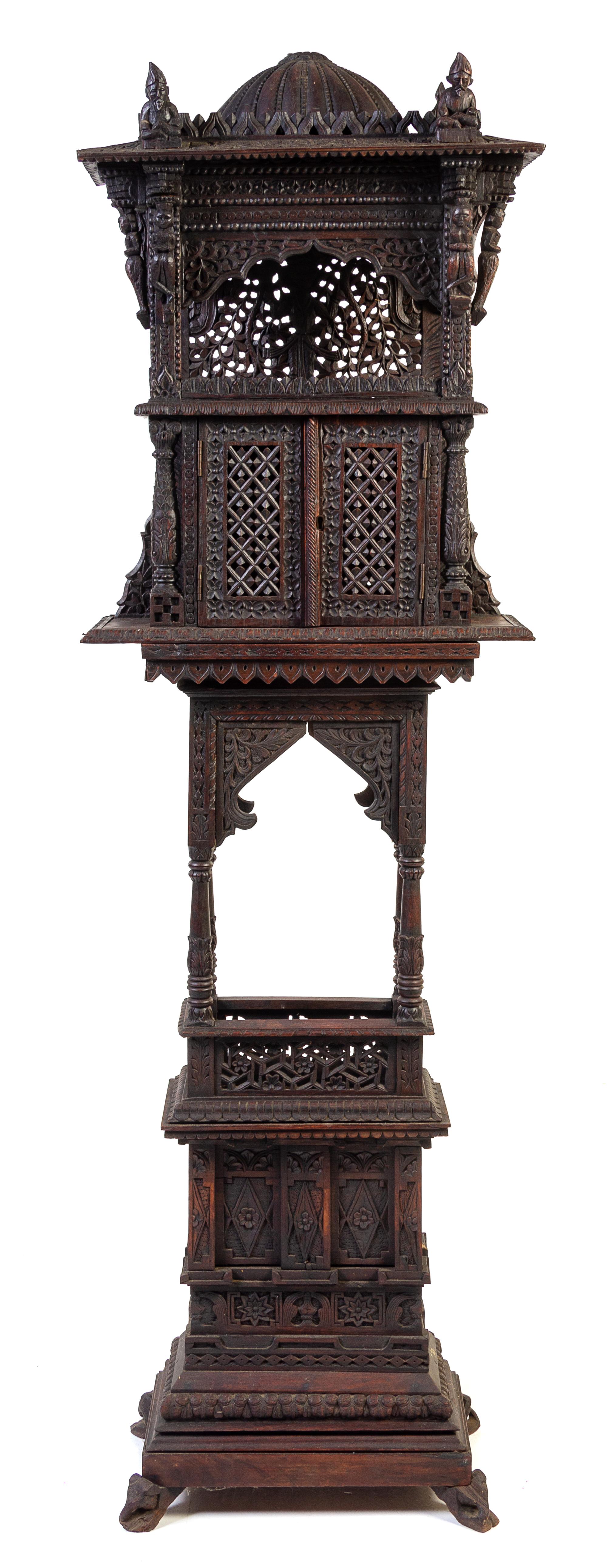 An Anglo-Indian Pierce Carved Shrine Cabinet Height 68 x width 20 1/2 x depth 8 3/4 inches. — LATE 19TH/EARLY 20TH CENTURY
