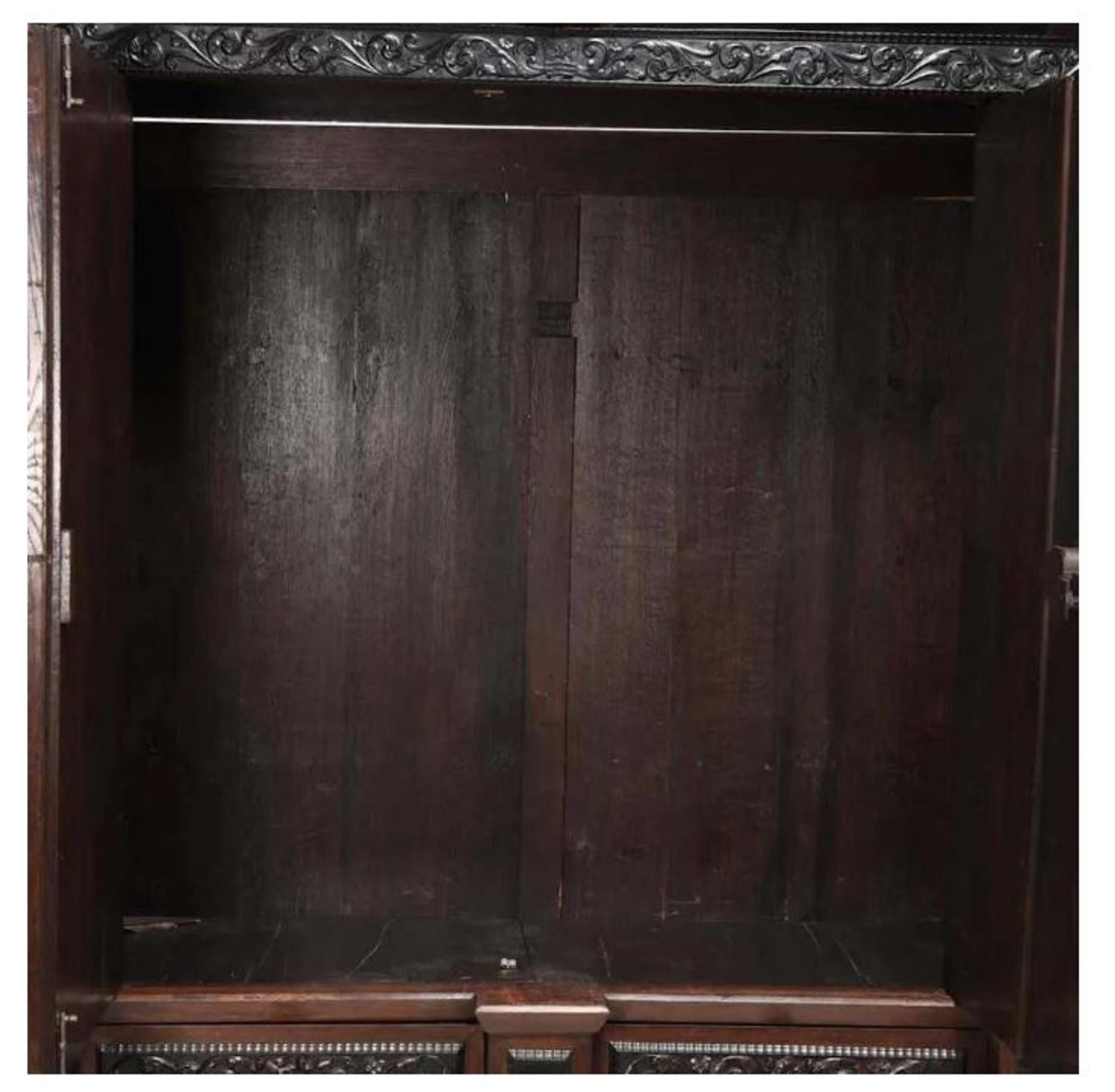 A Flemish Part-Ebonized Carved Rosewood Armoire — 17TH/18TH CENTURY