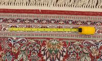 A Silk Tabriz Rug