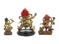 Three Tibetan Gilt Bronze Figures of Guardians
