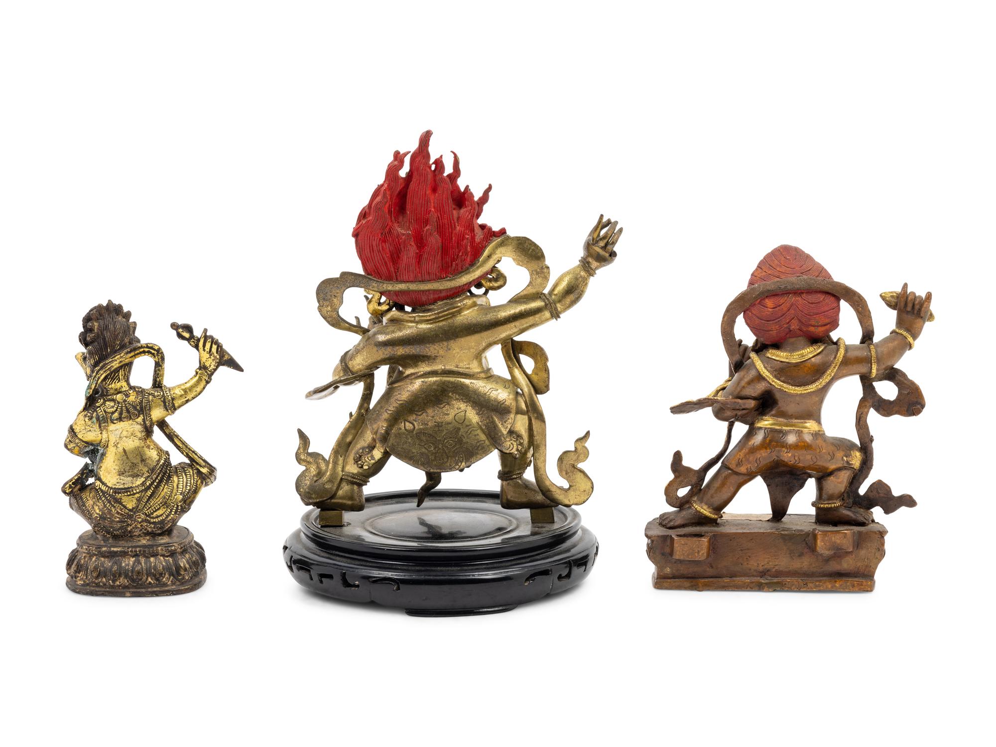 Three Tibetan Gilt Bronze Figures of Guardians