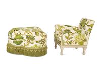 An Upholstered Armchair with Trefoil Shape Ottoman