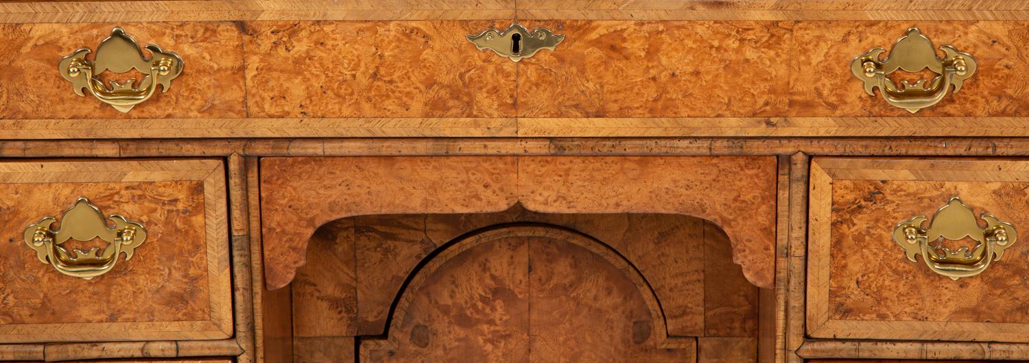 A George II Style Yew and Walnut Kneehole Desk