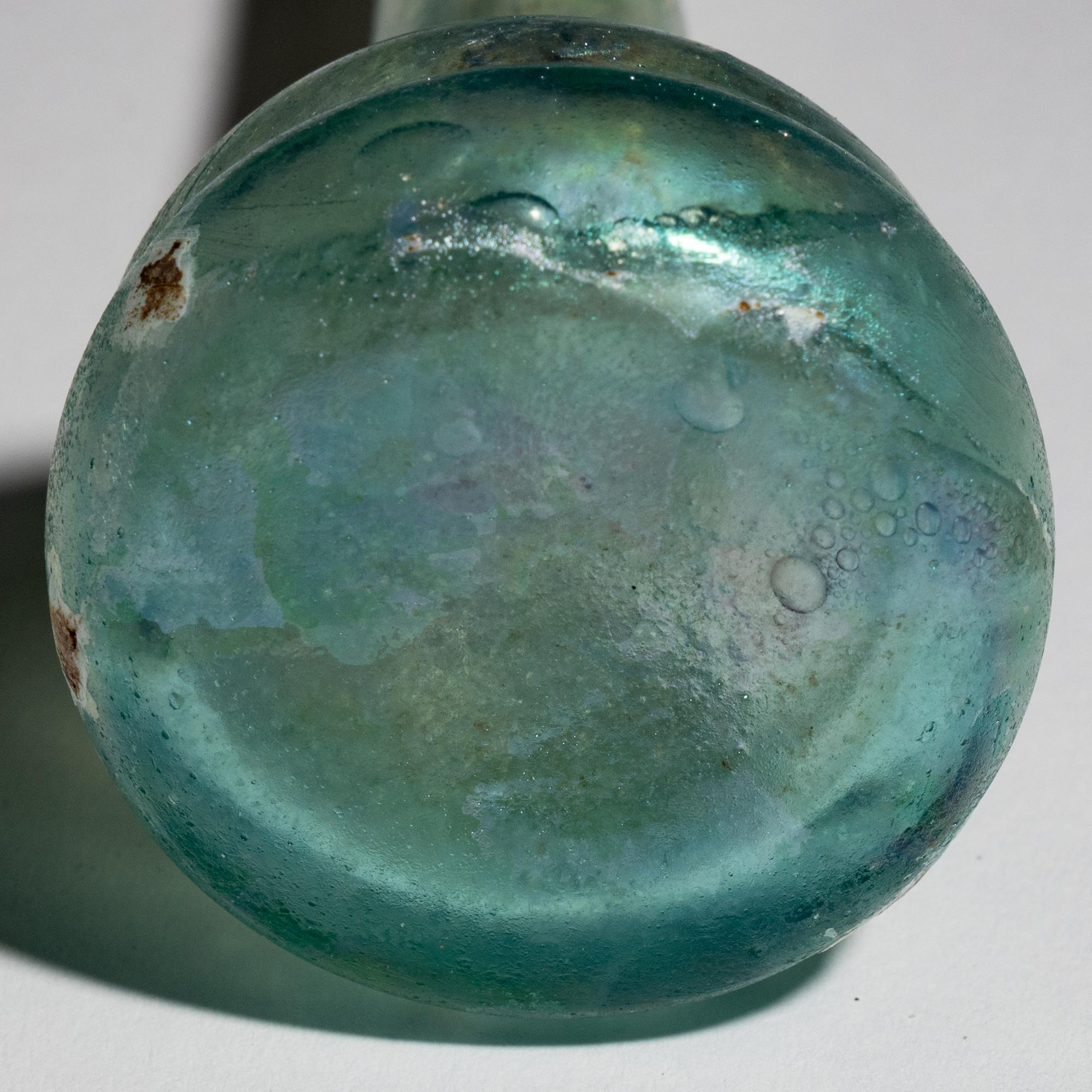 A Roman Glass Unguentarium