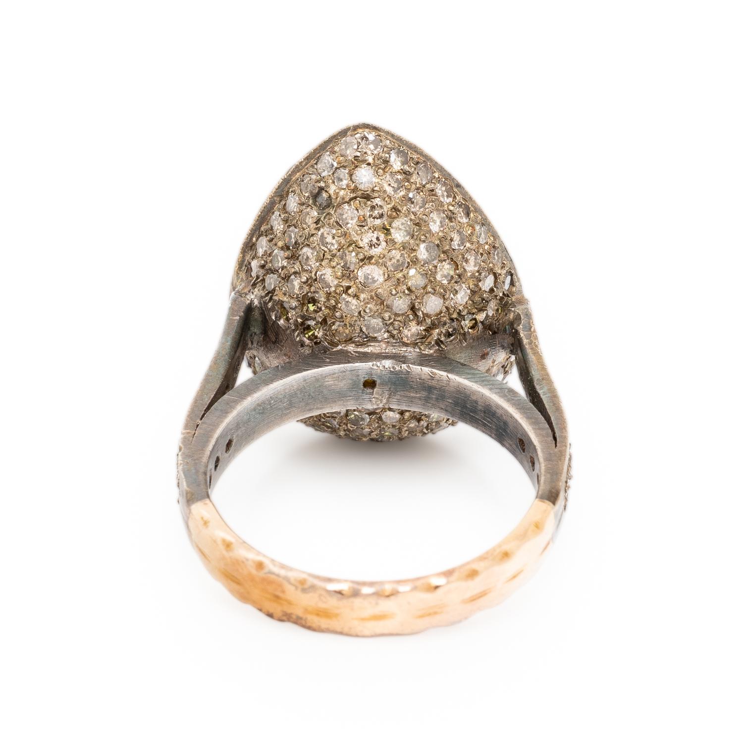 PERIDOT AND COLORED DIAMOND RING