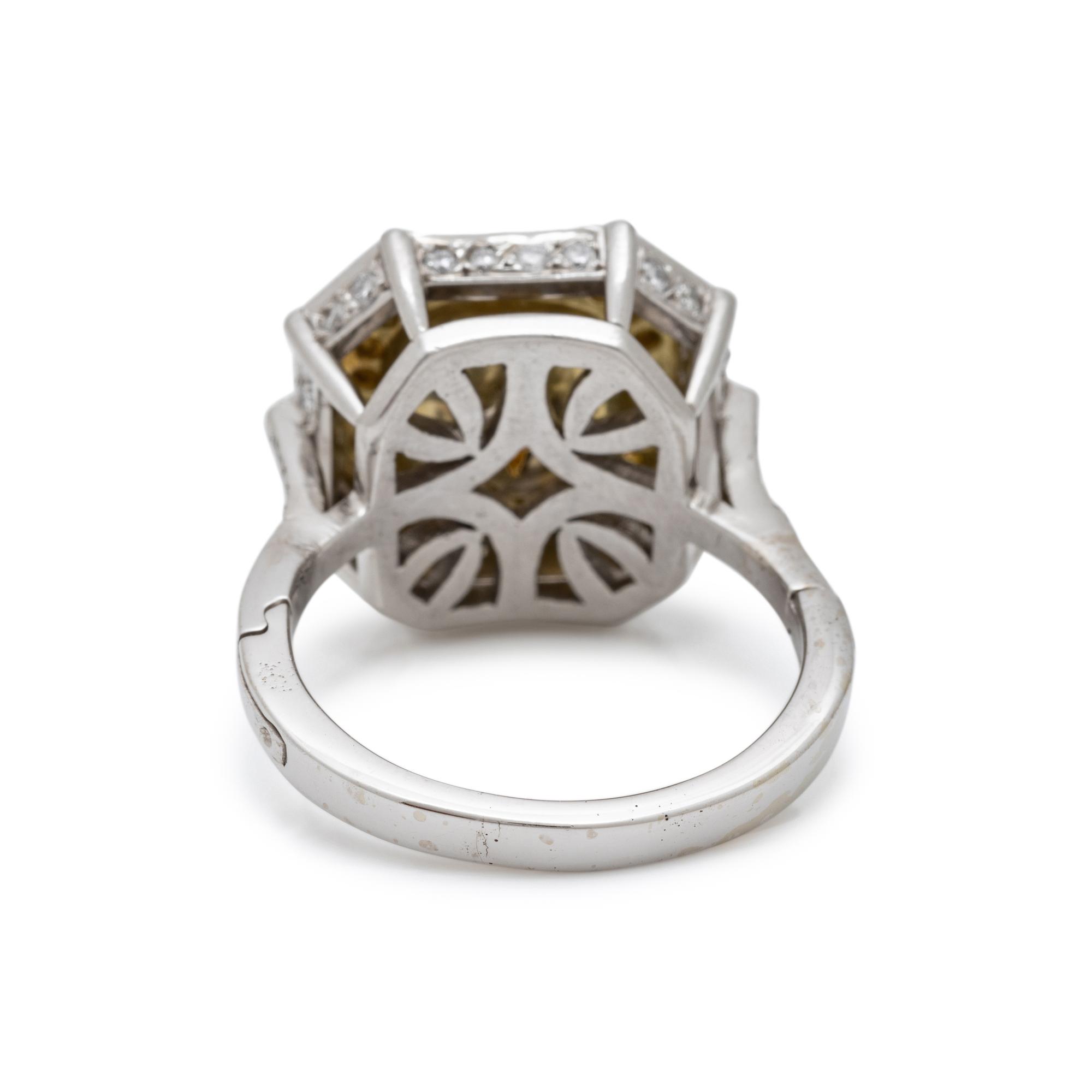 FANCY LIGHT YELLOW DIAMOND AND DIAMOND RING